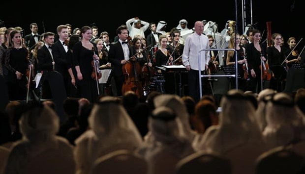 German-born music conductor Christoph Eschenbach leads an orchestra playing local Gulf melodies merged with Western symphonies in a performance inspired by the Louvre Abu Dhabi in the Emirati capital.