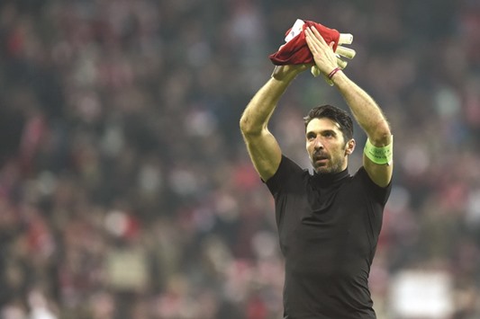 Juventusu2019 goalkeeper and captain Gianluigi Buffon reacts while leaving the pitch at the end of Champions League game.