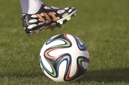 File picture of a player controlling the official 2014 World Cup ball - The Brazuca - during a training session at the Santa Cruz Stadium in Ribeirao Prato.