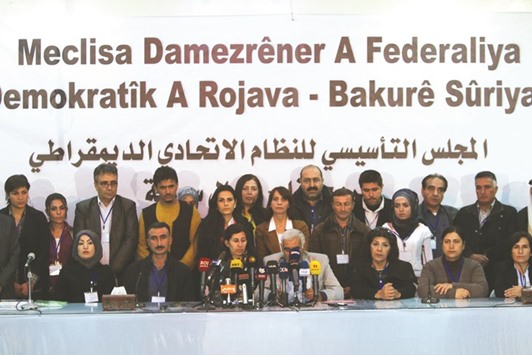 Delegates announce a federal system in Syriau2019s Kurdish-controlled northern regions in the town of Rmeilan.