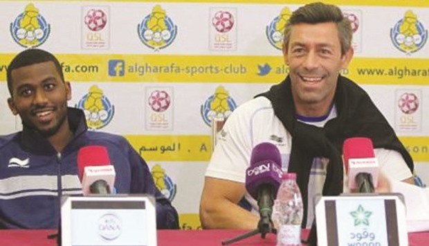 Al Gharafa coach Pedro Caixinha (right)