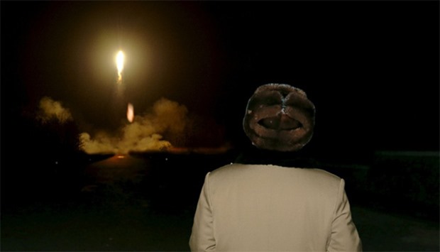 North Korean leader Kim Jong Un watches the ballistic rocket launch