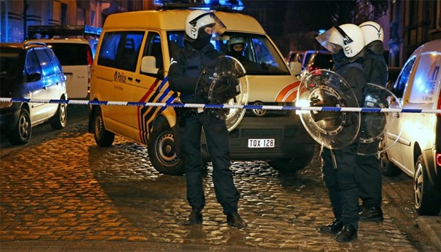 Belgian police arrested five people in counter-terror raids in Brussels