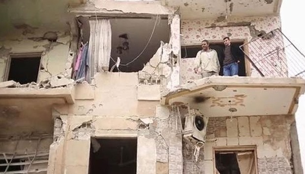 A residential building damaged in the air strikes at Raqqa