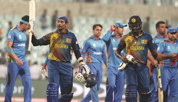 Sri Lanka opener Tillakaratne Dilshan (left) starred with an unbeaten 83 in their six-wicket win over Afghanistan in their opening game of the World Twenty20 on Thursday, but face a much tougher task against an unpredictable West Indies side, which has the destructive Chris Gayle at the top of their order, today. (AFP)