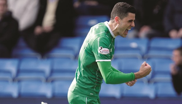 Celticu2019s Tom Rogic celebrates after scoring a goal against Kilmarnock yesterday. (Reuters)
