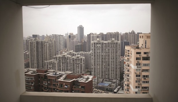 Buildings of a residential compound are seen in Shanghai. Chinau2019s home prices rose 3.6% in February, above the previous monthu2019s 2.5% gain, an official survey showed.