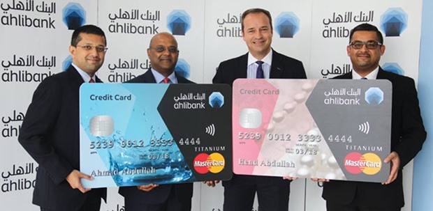 McKechnie (second right) with Sanjay Radhakrishnan, Group head, MasterCard regional technology lead (Middle East Africa); Prasad; and Ahmad Z Kidwai, Ahlibank head (Retail Products); at the launch of the u201cfirst contactlessu201d credit card in Qatar.
