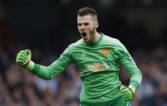 Goalkeeper David de Gea celebrates after Marcus Rashford scored for Manchester United against Manchester City yesterday.