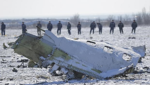A piece of debris is seen at the crash site of a Boeing 737-800 flight operated by Flydubai in Rostov-On-Don.