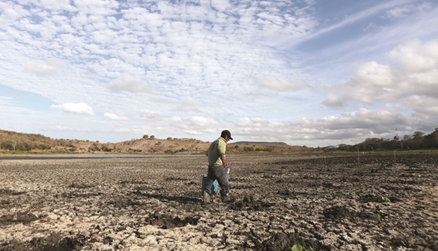 A farmer watering a field in Playitas town, Nicaragua. World Water Day is being marked today.
