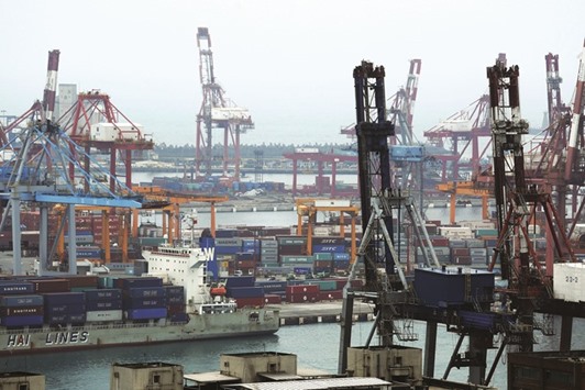 Shipping containers are seen at Keelung port. Taiwanu2019s export orders in February fell 7.4% year-on-year, better than a 9.95% slide predicted by economists in a Reuters poll, data showed yesterday.