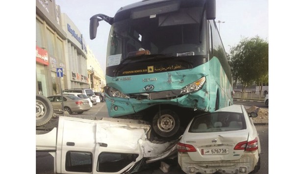 A Karwa school bus ended up over a pick-up and a car, in a service road parallel to Airport Road in Al Rawdah area early morning yesterday in an accident. Sources said the accident resulted in injuries to at least three people, including the drivers of the bus and the pick-up. According to the Ministry of Education and Higher Education, the bus had no passengers other than the driver as it was on its way to collect children of Al Wafaa Model School for Boys (picture from social media).