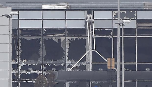 The damaged facade of Brussels airport following the explosions
