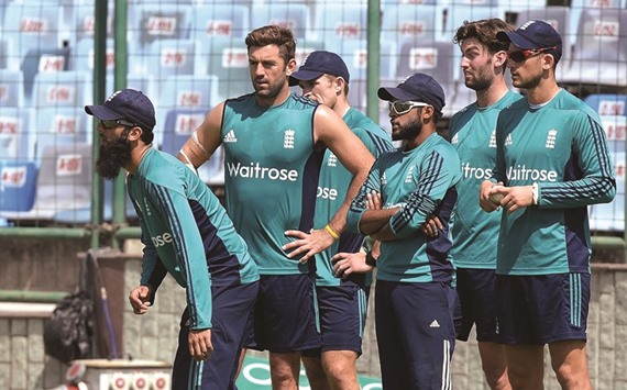 Moeen Ali (left), Liam Plunkett (2nd left) and Adil Rashid (3rd right) during the England team's training session in New Delhi yesterday. (AFP)
