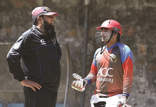 Afghanistan captain Asghar Stanikzai (right) with coach Inzamam-ul-Haq during a training session in New Delhi yesterday. Afghanistan play England in a World Twenty20 match today. (AFP)