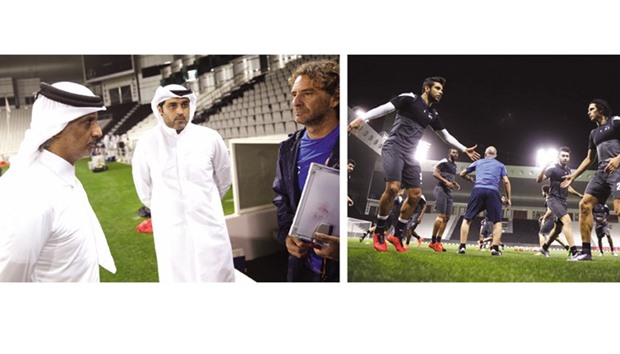 Qatar Football Association president Sheikh Hamad bin Khalifa bin Ahmed al-Thani speaks to Qatar coach Daniel Carreno during a training session in Doha yesterday. Qatar are getting ready to take on Hong Kong in their Asian Zone Group C qualifier on the road to the 2018 World Cup in Russia. The match is only of academic interest to Qatar as they have already made the final stage of qualifying from Asia thanks to their all-win record from six group matches so far.