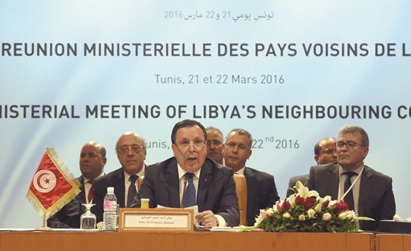 Tunisian Foreign Affairs Minister Khemais Jinnaoui speaks during the 8th ministerial meeting of Libyau2019s neighbouring countries yesterday in Tunis. Foreign ministers of neighbouring countries of conflict-wracked Libya are expected to meet together with Arab League chief and UN and EU officials.