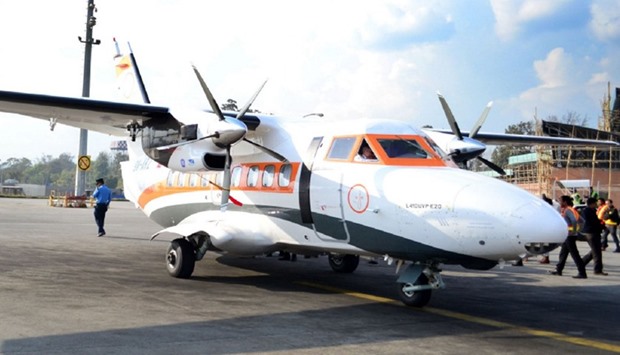 A 19-seater plane belonging to Goma Air parked at Kathmandu airport.