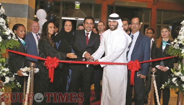 Fardan Fahad Hussain Alfardan, along with other officials, cutting a ribbon to open the  boutique of Jeeves of Belgravia at The Pearl-Qatar. PICTURES: Jayan Orma