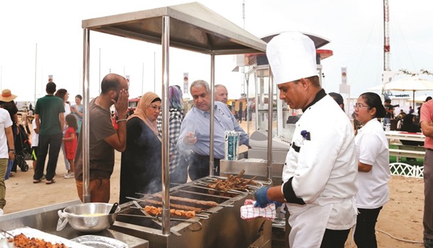 Stalls serve a variety of food and dishes at The Pearl-Qatar as part of QIFF 2016.