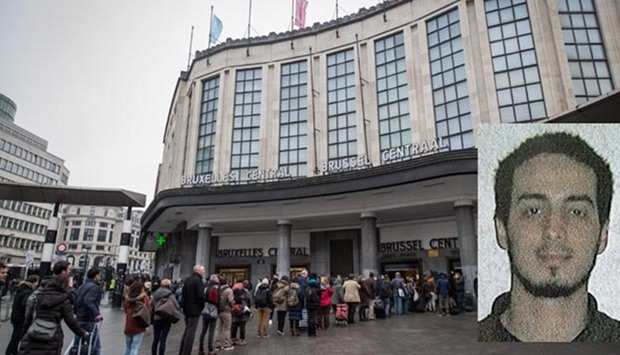 People queue at the entrance of Brussels' Central station Wednesday, a day after the attacks on Brussels airport and a metro station. (Inset) Najim Laachraoui.