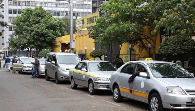 Taxis parked outside a restaurant in Nairobi.