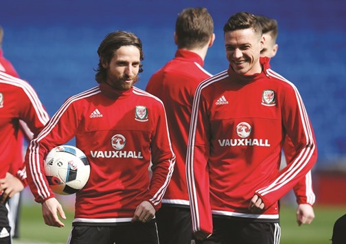 Walesu2019 Joe Allen and James Chester (R) during a training session in Cardiff yesterday. (Reuters)