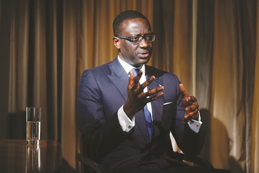 Credit Suisse Group CEO Tidjane Thiam gestures whilst speaking during a Bloomberg Television interview in London yesterday. u201cWeu2019re cutting deeper, there will be more restructuring costs,u201d Thiam said in the interview with Francine Lacqua.