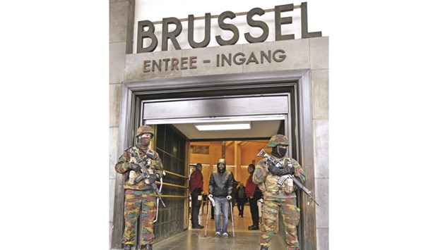 Police control the access to Brussels central train station following Tuesdayu2019s bomb attacks.