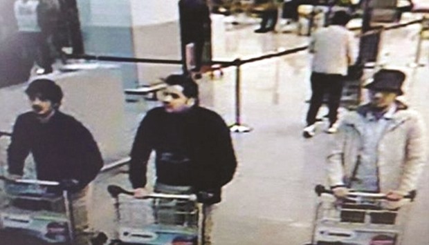 This CCTV image from the Brussels Airport surveillance cameras made available by Belgian Police shows what officials believe may be suspects in the Brussels airport attack.