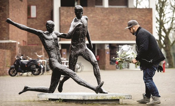 Sweden defender who was tricked by the Cruyff Turn at the 1974 WC.  A man lays flowers at the foot of a statue of late Dutch football legend Johan Cruyff, near the Olympic Stadium in Amsterdam.