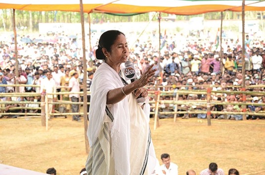 West Bengal Chief Minister and Trinamool Congress chief Mamata Banerjee addresses an election rally in West Midnapore, West Bengal, yesterday. Claiming that eight of her party workers were murdered by the CPI-M supporters in seven days, Banerjee virtually held the Election Commission (EC) responsible for political killings yesterday.