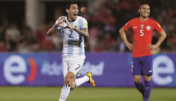 Argentina striker Angel Di Maria celebrates after scoring against Chile in their World Cup qualier on Thursday. (Reuters)