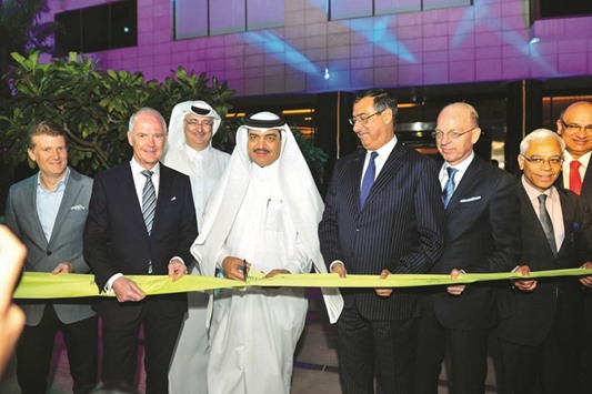 HE Mohamed bin Abdullah al-Rumaihi along with other dignitaries at the ribbon-cutting ceremony.