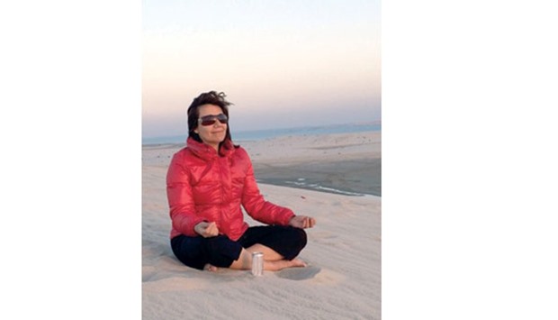FINDING PEACE: Rossana Surballe says she loves practicing meditation in the desert in Qatar.