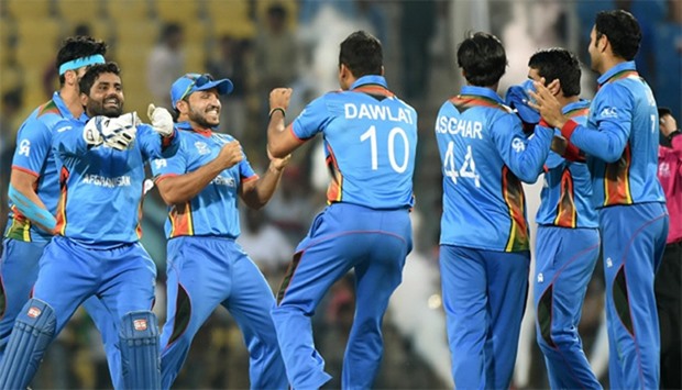 Afghanistan's players celebrate after winning
