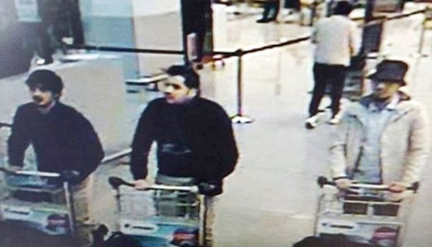 This CCTV image from the Brussels airport surveillance cameras, made available by Belgian Police, shows suspects in the  bomb attack on March 22.