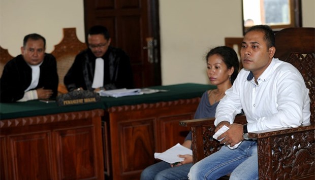 Sayed Mohammed Said of India (R) sits in the courtroom as he awaits his sentencing on drugs related charges in Denpasar on Indonesia's resort island of Bali. AFP
