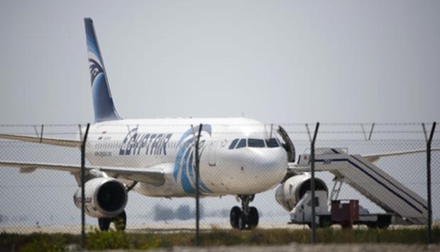 An EgyptAir Airbus A320 sits on the tarmac of Larnaca airport after it was hijacked.