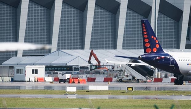 Authorities are running a series of tests to see if makeshift check-in facilities are good enough to restart some flights at Brussels airport.