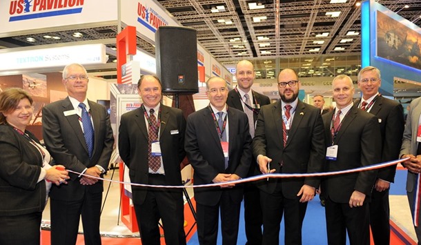 US embassyu2019s charge du2019affaires Ryan Gliha cutting a ribbon to mark the opening of the US pavilion at Dimdex yesterday as representatives of US companies look on. PICTURE: Shaji Kayamkulam