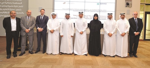 Officials of QU and MO-RTC pose for a photo after the signing ceremony.