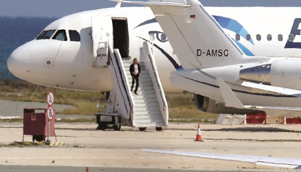 A man believed to be the hijacker of the EgyptAir Airbus A-320, which was diverted to Cyprus, leaving the plane before surrendering to security forces after a six-hour standoff on the tarmac at Larnaca airportu2019s largely disused old terminal yesterday.