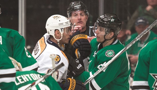 Nashville Predators center Mike Ribeiro (R) and Dallas Stars left wing Antoine Roussel exchange words during the second period at the American Airlines Center. PICTURE: USA TODAY Sports