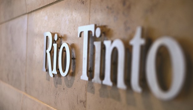 The Rio Tinto logo is mounted on a wall near the reception area of the companyu2019s offices in Melbourne. The companyu2019s shares jumped 5.9% to 1,973 pence yesterday.