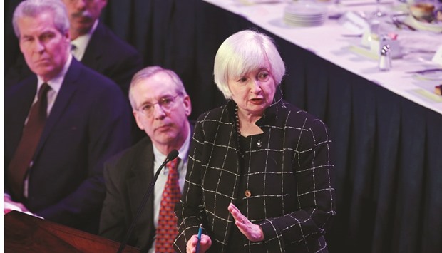 Yellen is applauded before speaking to the Economic Club of New York on Tuesday. Yellen said inflation had not yet proven durable against the backdrop of looming global risks to the US economy.