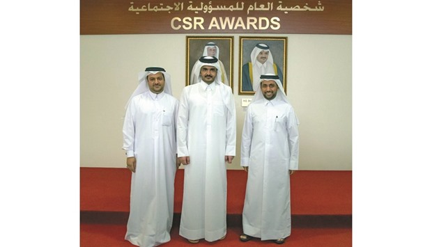 HE Sheikh Joaan bin Hamad al-Thani flanked by QU president Dr Hassan Rashid al-Derham and Qatar CSR CEO Khalifa S al-Mohannadi at the CSR event yesterday.