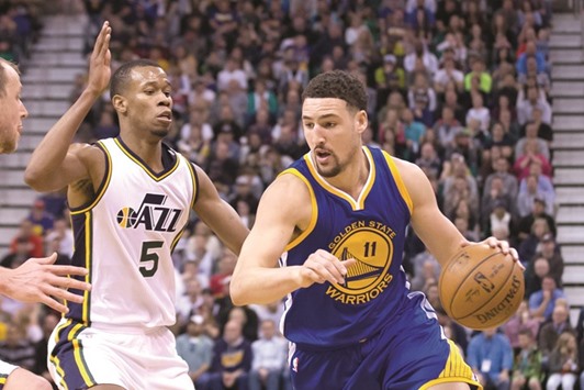 Golden State Warriors guard Klay Thompson (R) dribbles the ball in front of Utah Jazz guard Rodney Hood during the second half at Vivint Smart Home Arena. PICTURE: USA TODAY Sports