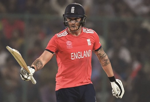 Englandu2019s Jason Roy celebrates after scoring a half-century during the World T20 first semi-final match between England and New Zealand in New Delhi.